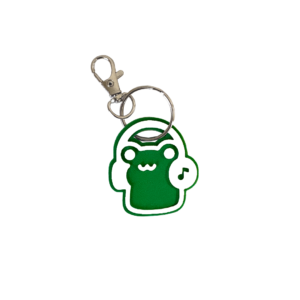 Cute green frog headphones NFC keychain with goofy smile and minimalist white line design (has music note design on headphones)